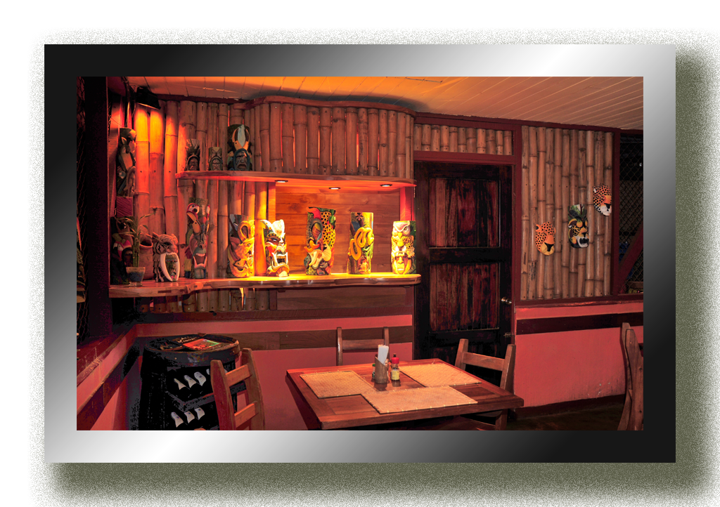 The Boruca's masks Corner, one detail of the interirors of Il Giardino Italian restaurant in Puerto jimeenz, Osa peninsula